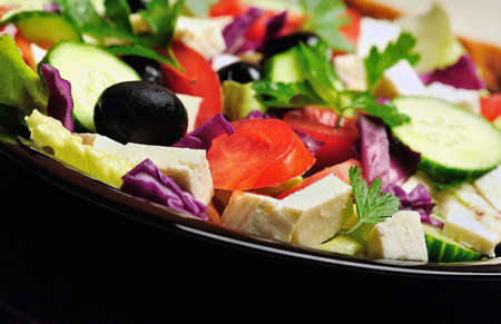 Plate with salad on tableの写真素材