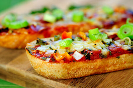 Bruschette with salami on tableの写真素材