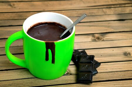 green coffe cup on wood tableの写真素材