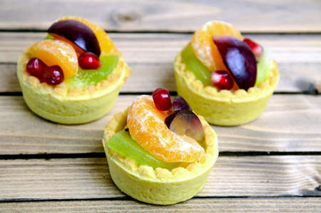 Fruit tart on wooden tableの写真素材