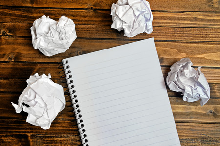 Empty notepad on wooden tableの写真素材