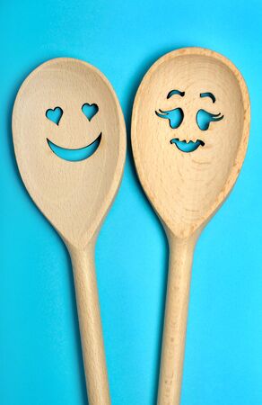 Wooden spoon on blue backgroundの写真素材