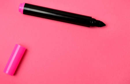 Marker on empty pink backgroundの写真素材