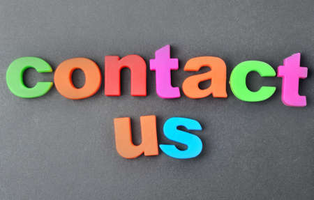 Contact us words on gray backgroundの写真素材