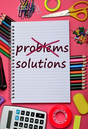 Problems Solutions words on notebook pageの写真素材