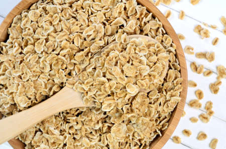 Heap of oats on bamboo bowl