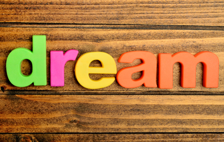 The word Dream on wooden tableの写真素材
