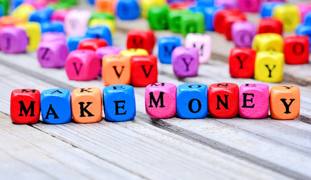 Make money words on wooden tableの写真素材