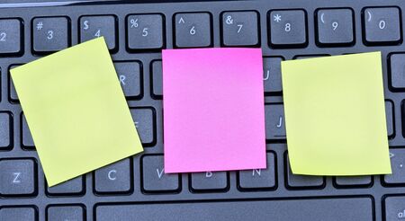 Three empty notes on keyboard computer