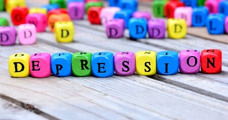 Depression word on wooden tableの写真素材