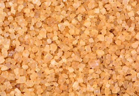 Background of beige sugar closeupの写真素材