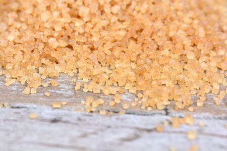 Sugar on wooden table closeupの写真素材