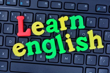 Learn english words on computer keyboard closeupの写真素材