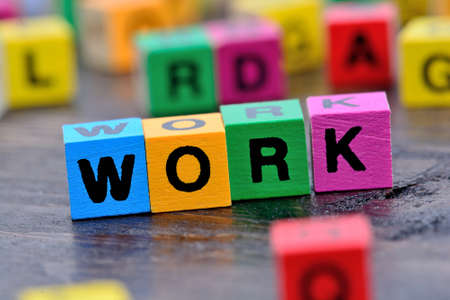The word Work on wooden tableの写真素材