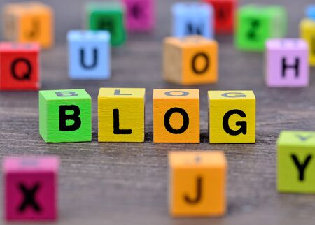 The word Blog on wooden tableの写真素材