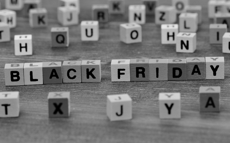 Black Friday words on wooden tableの写真素材