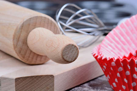 Kitchen tools on wooden table close-up