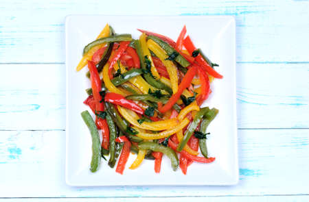 Pepper salad in a plate on table close-upの写真素材