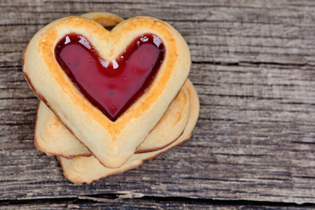 Heart cookies on wooden tableの写真素材