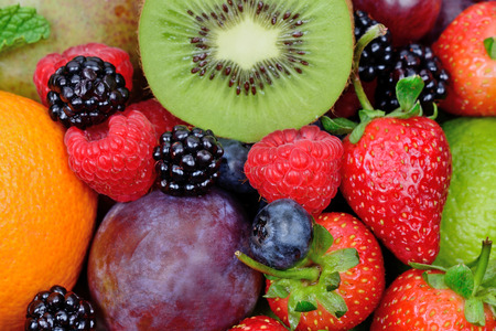 Close up of mix of fruits on backgroundの写真素材