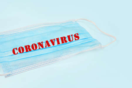 Close up of coronavirus word on facemaskの写真素材