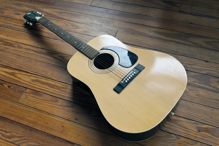 1960's Acoustic Guitar on a dance floorの写真素材