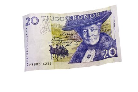Swedish Currency with the Queen. Twenty Kronor isolated with clipping path.の写真素材