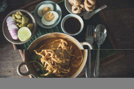 Northern style Egg Noodles in Chicken Curry Soupの写真素材