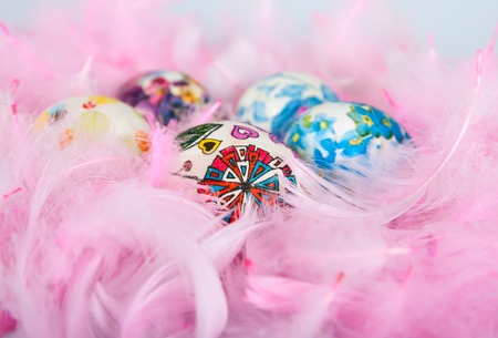 Multi-colored Easter eggs prepared for Easter and photographed against a background ofの写真素材