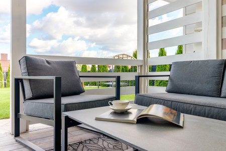 Picture of arbor with comfortable garden furniture.の写真素材