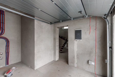 Repairs in the building. Building with a metal staircase at the time of renovation. Construction site in the house without people. Construction of a new house. construction and architecture.の写真素材