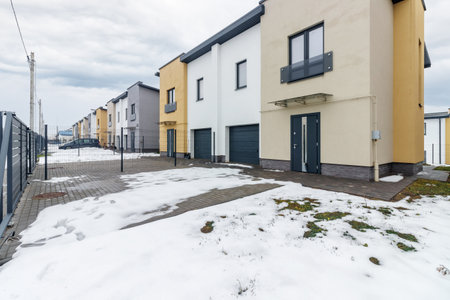 houses in residential community after snow in winter.の写真素材