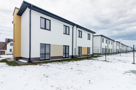 houses in residential community after snow in winter.の写真素材