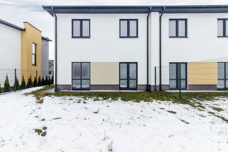 houses in residential community after snow in winter.の写真素材