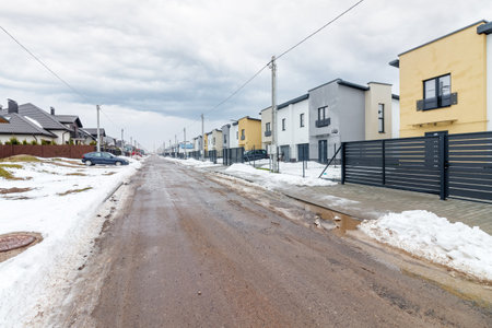 houses in residential community after snow in winter.の写真素材