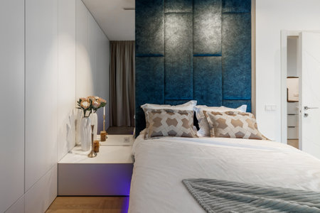 Stylish bedroom interior with an elegant toilet table and access to the balcony.の写真素材