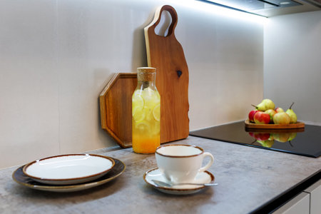 stylish decor of a modern kitchen. various items of kitchen utensils on a wooden countertop. front viewの写真素材