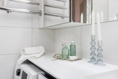 Decorative bottles as a decor for a bathroom in a light style.の写真素材