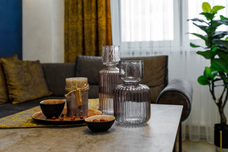 Countess for water is glass, blue as a decor on the coffee table. close-up.の写真素材