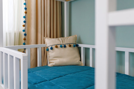 Double -tier bed for a child with decor elements, in a modern apartment.の写真素材
