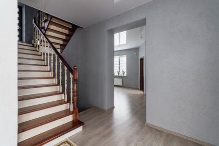 Modern natural ash tree wooden stairs in new house interior.の写真素材