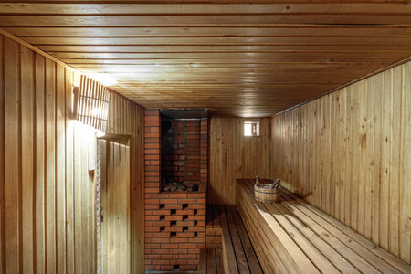 Sauna steam bath inside with stones and stove.の写真素材