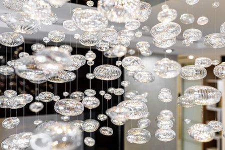 Luxury Crystal Chandelier. Close up on the crystal of a contemporary crystal decoration.の写真素材