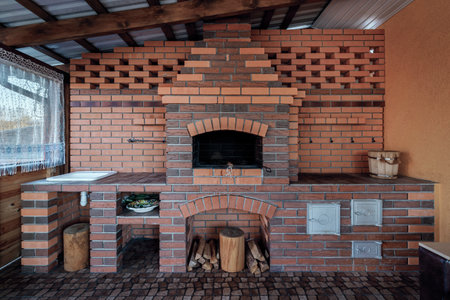 Russian wood stove. The stove is made of brick. Stove heating of a country houseの写真素材
