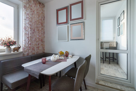 Stylish dining room interior design with dining table. Creative walls, white and wooden pannelsの写真素材
