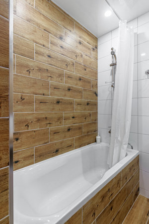 Modern bathroom in white washing and bathroom, and a big shower.の写真素材