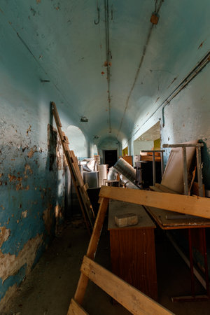 Dark and creepy dirty abandoned underground basement.の写真素材