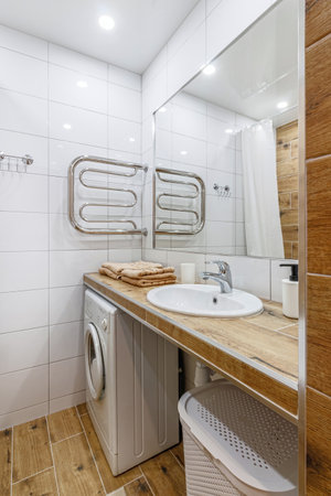 Modern bathroom in white washing and bathroom, and a big shower.の写真素材