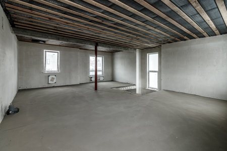Repairs in the building. Building with a metal staircase at the time of renovation. Construction site in the house without people. Construction of a new house. construction and architecture.の写真素材