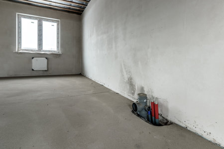 Repairs in the building. Building with a metal staircase at the time of renovation. Construction site in the house without people. Construction of a new house. construction and architecture.の写真素材
